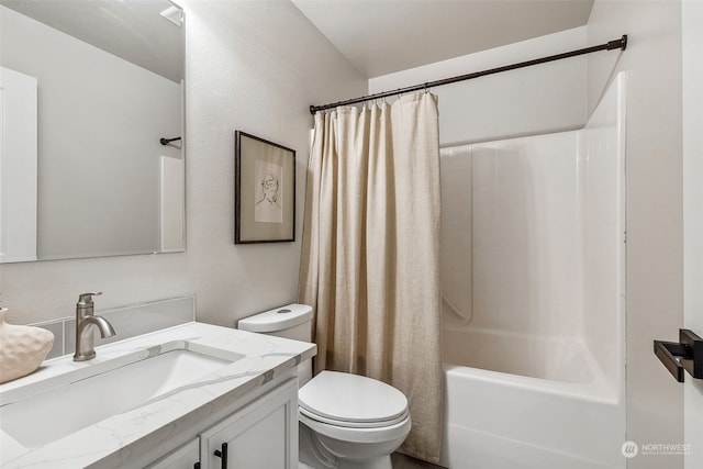 full bathroom featuring toilet, shower / bathtub combination with curtain, and vanity