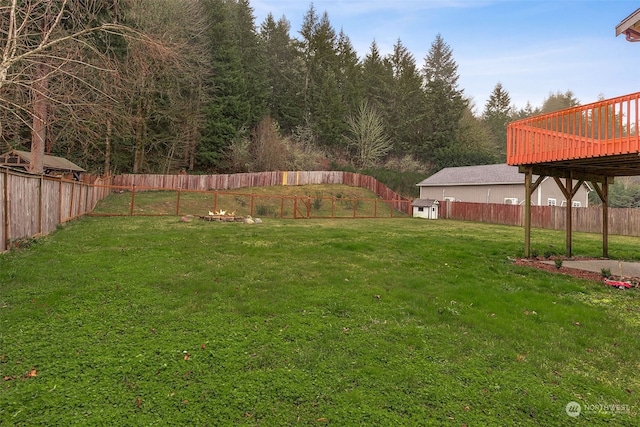 view of yard featuring a wooden deck