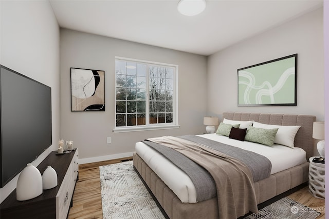 bedroom featuring light hardwood / wood-style floors