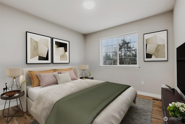 bedroom featuring wood-type flooring