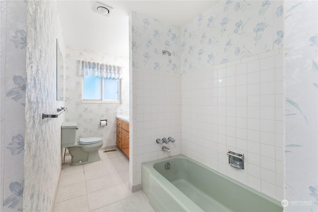 bathroom with tile patterned floors, vanity, and toilet