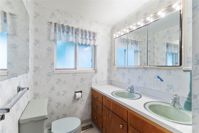 bathroom with vanity and toilet