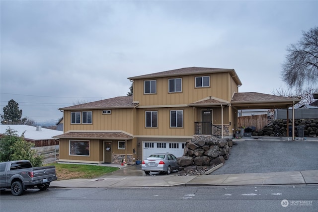 view of front of property featuring a garage