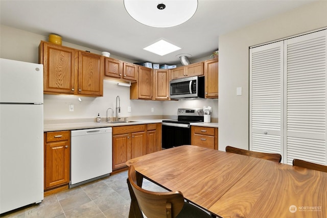 kitchen with sink and stainless steel appliances