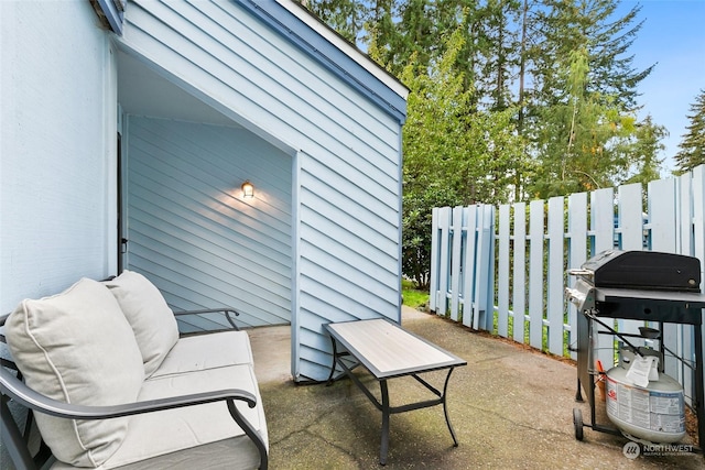 view of patio with a grill