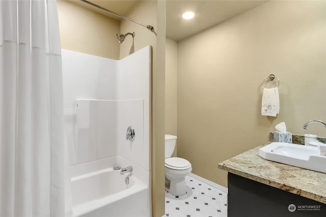 full bathroom featuring vanity,  shower combination, and toilet