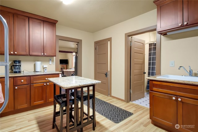 kitchen featuring sink and light hardwood / wood-style floors