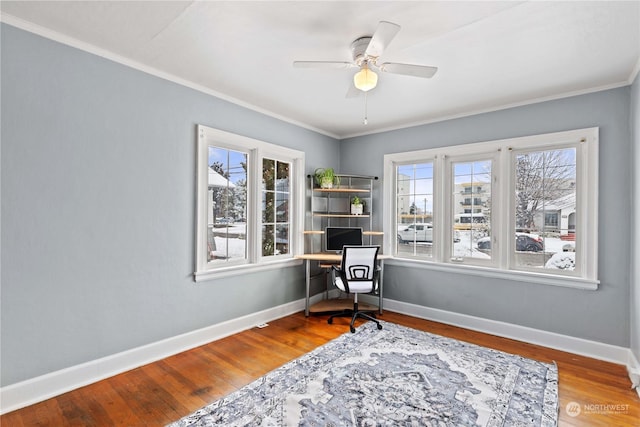 office area with hardwood / wood-style flooring, ceiling fan, and a healthy amount of sunlight