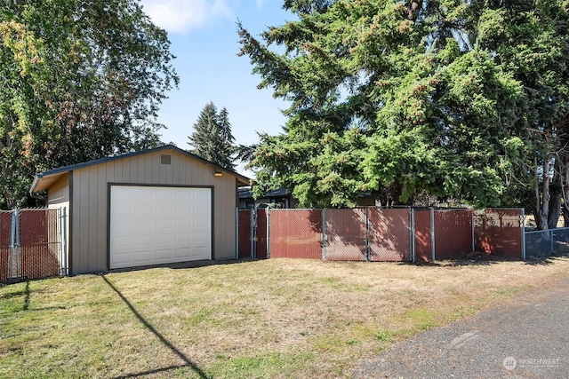 garage with a yard