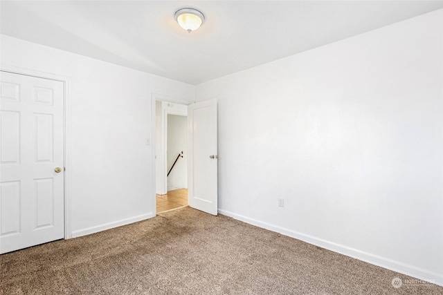 unfurnished bedroom featuring carpet floors