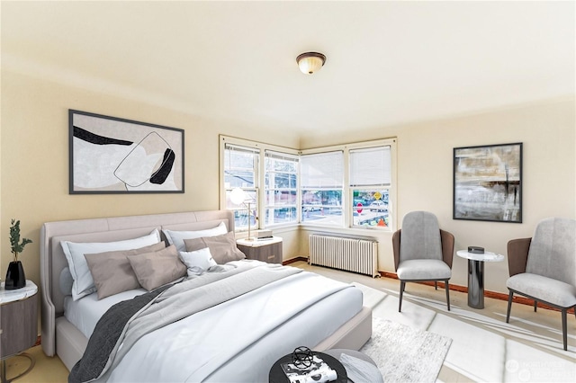 bedroom featuring radiator heating unit