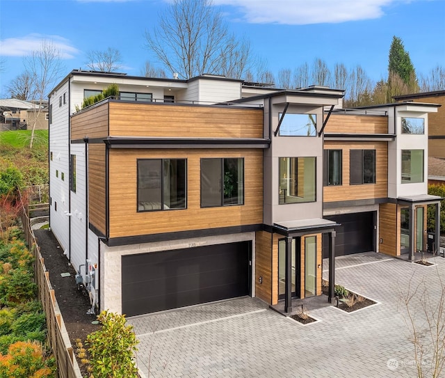 modern home featuring a garage