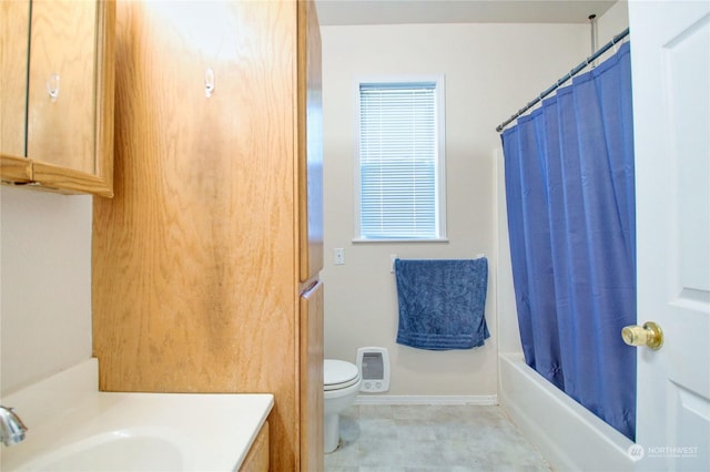 full bathroom with shower / bath combo, vanity, and toilet