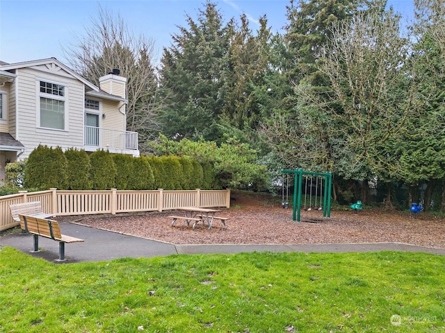 view of playground with a yard