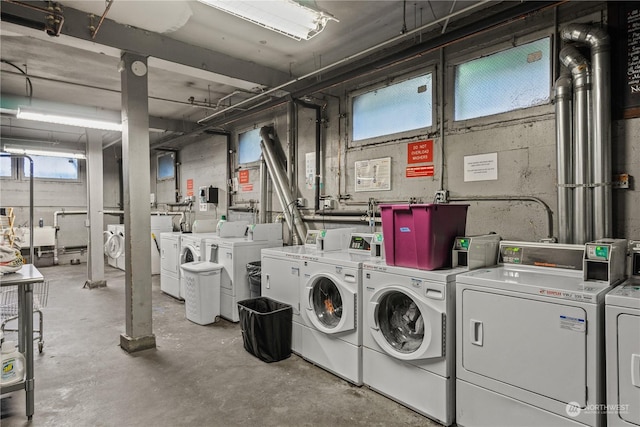 washroom featuring washer and dryer