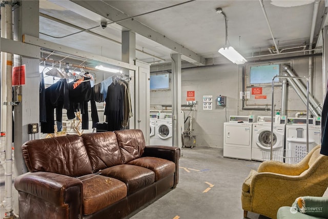 basement featuring washing machine and clothes dryer