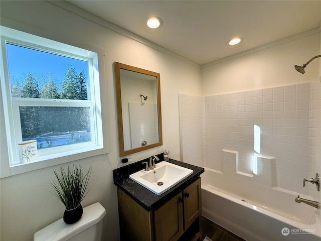 full bathroom with washtub / shower combination, vanity, and toilet