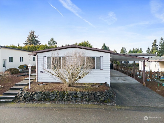 manufactured / mobile home with a carport