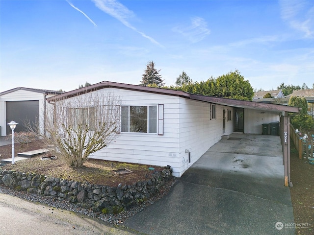 view of front of property with a carport