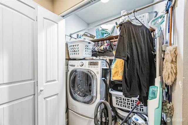 laundry area with washer / dryer