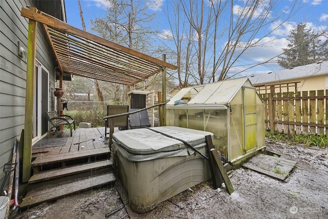wooden deck with an outbuilding