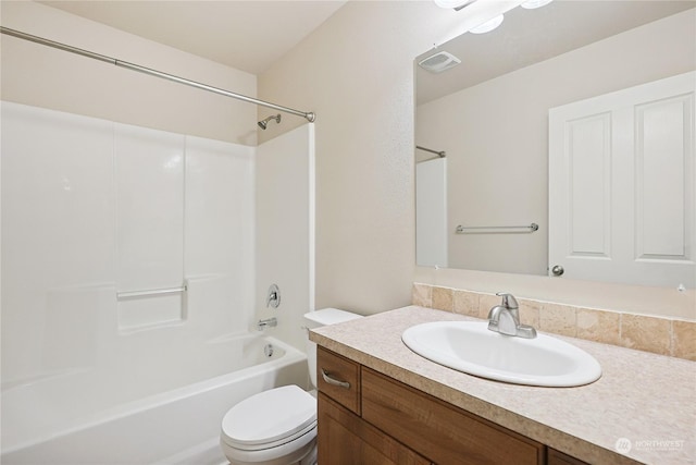 full bathroom featuring vanity, shower / bath combination, and toilet