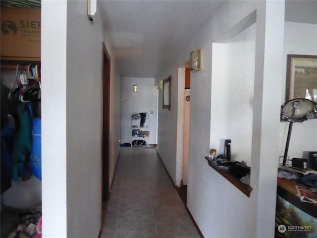 hall featuring tile patterned flooring