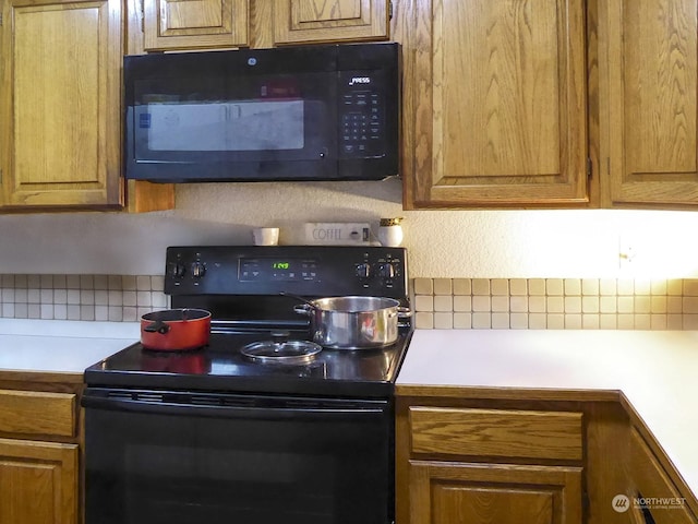 kitchen with black appliances