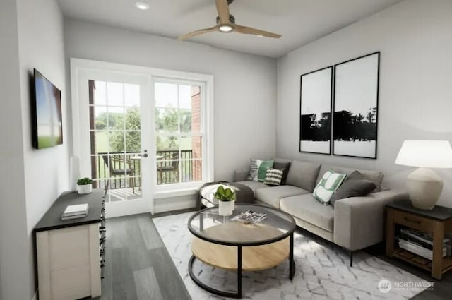 living room featuring ceiling fan and wood finished floors