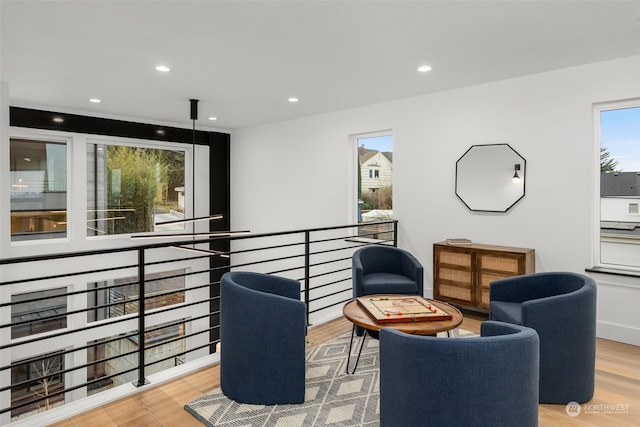 sitting room with light hardwood / wood-style flooring