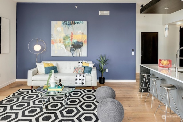 living room featuring light hardwood / wood-style floors