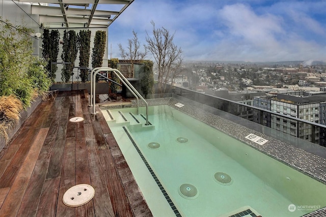 view of pool featuring a jacuzzi