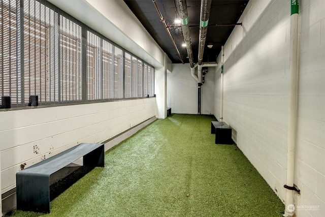 hallway featuring carpet