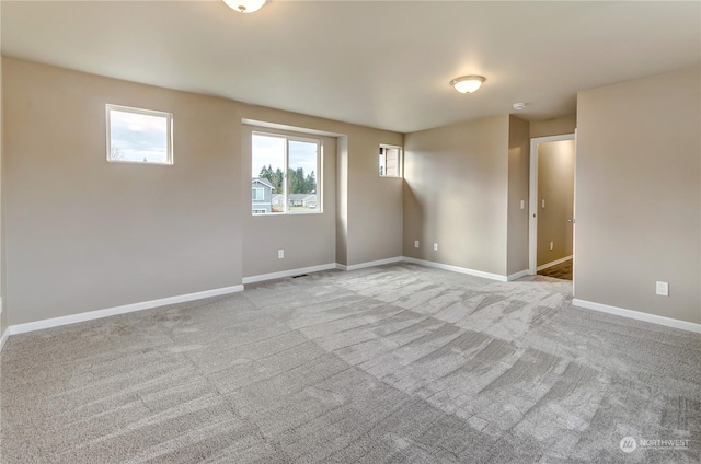 view of carpeted spare room