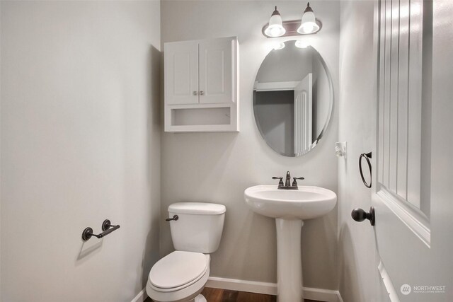 bathroom with toilet and sink