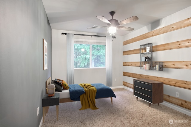 sitting room featuring ceiling fan and carpet flooring