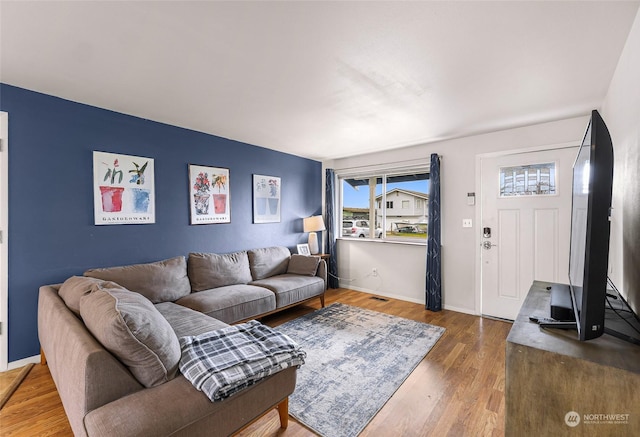 living room with hardwood / wood-style flooring