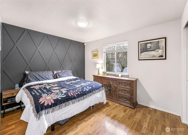 bedroom featuring light wood-type flooring