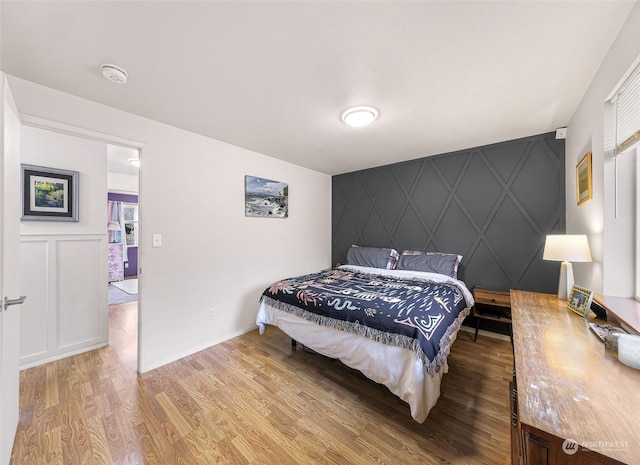 bedroom featuring light wood-type flooring