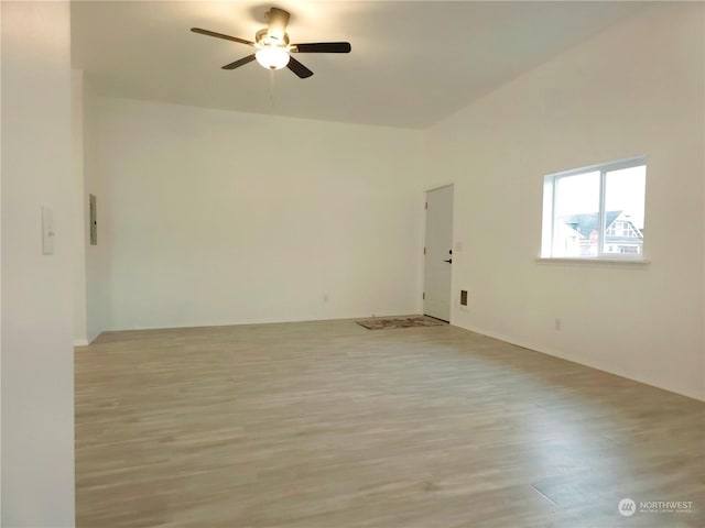 unfurnished room with ceiling fan and light hardwood / wood-style floors