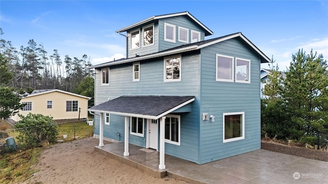 view of front of property featuring a patio area