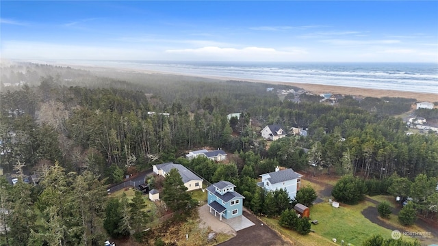 aerial view with a water view and a view of the beach