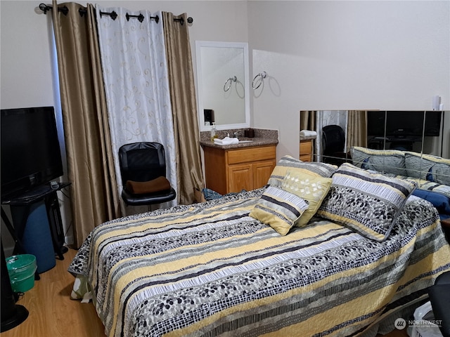 bedroom featuring light wood-type flooring