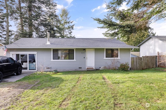 ranch-style house featuring a front yard