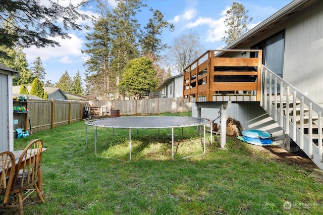 view of yard featuring a trampoline