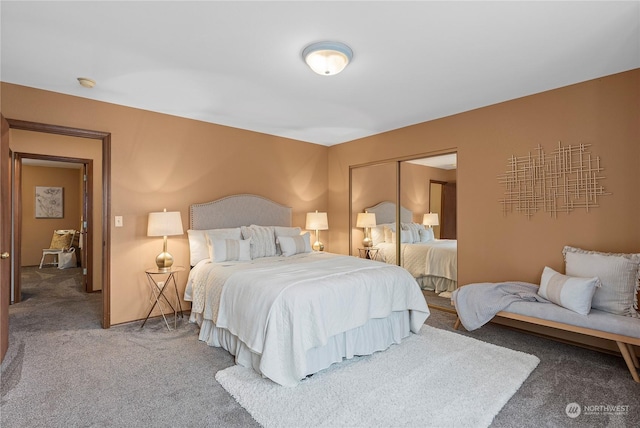 carpeted bedroom featuring a closet