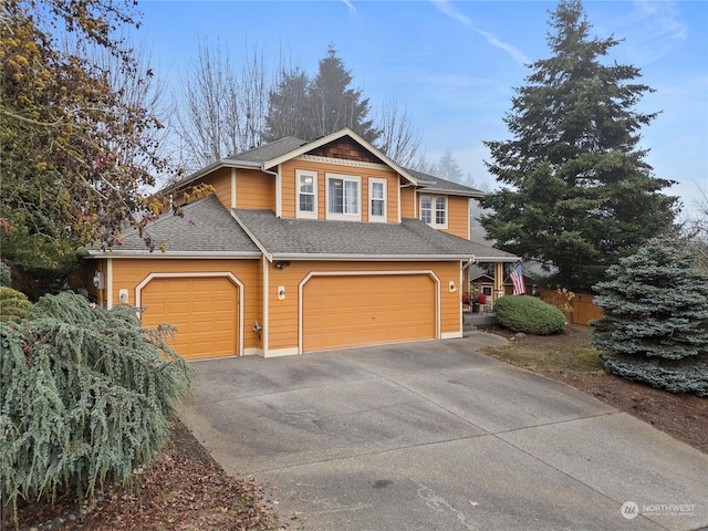 view of front of property with a garage