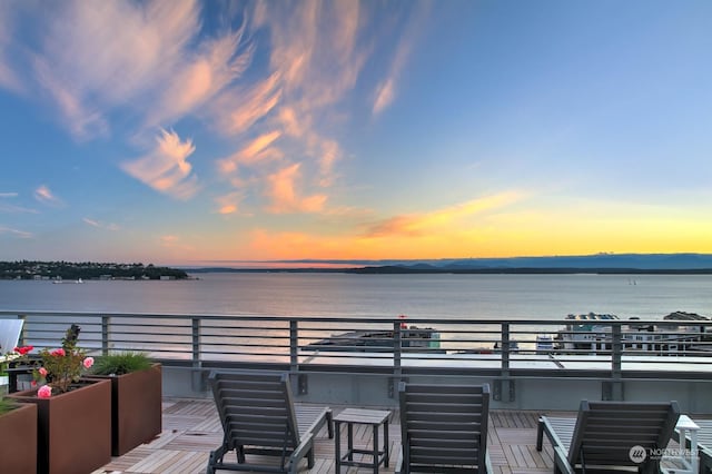 deck at dusk with a water view