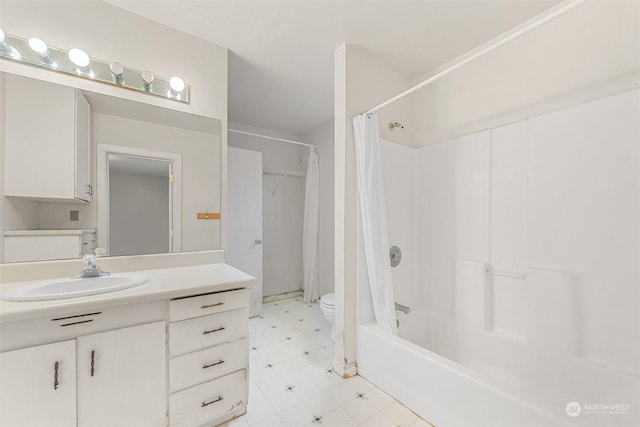 full bathroom with shower / bath combo with shower curtain, vanity, and toilet