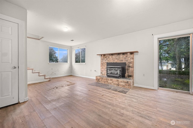 unfurnished living room featuring light hardwood / wood-style flooring